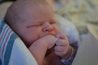 Finding his fingers for the first time :)